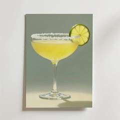 Bozetto Golden Margarita Drink Poster föreställer ett cocktailglas med en gul drink, limehjul och saltkant mot en ljus bakgrund - perfekt för att skapa en levande stil i ditt rum.