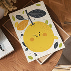 The no-9 features a cheerful illustration of a smiling yellow fruit, surrounded by colorful leaves, resting on a wooden table with a book and a chair nearby.