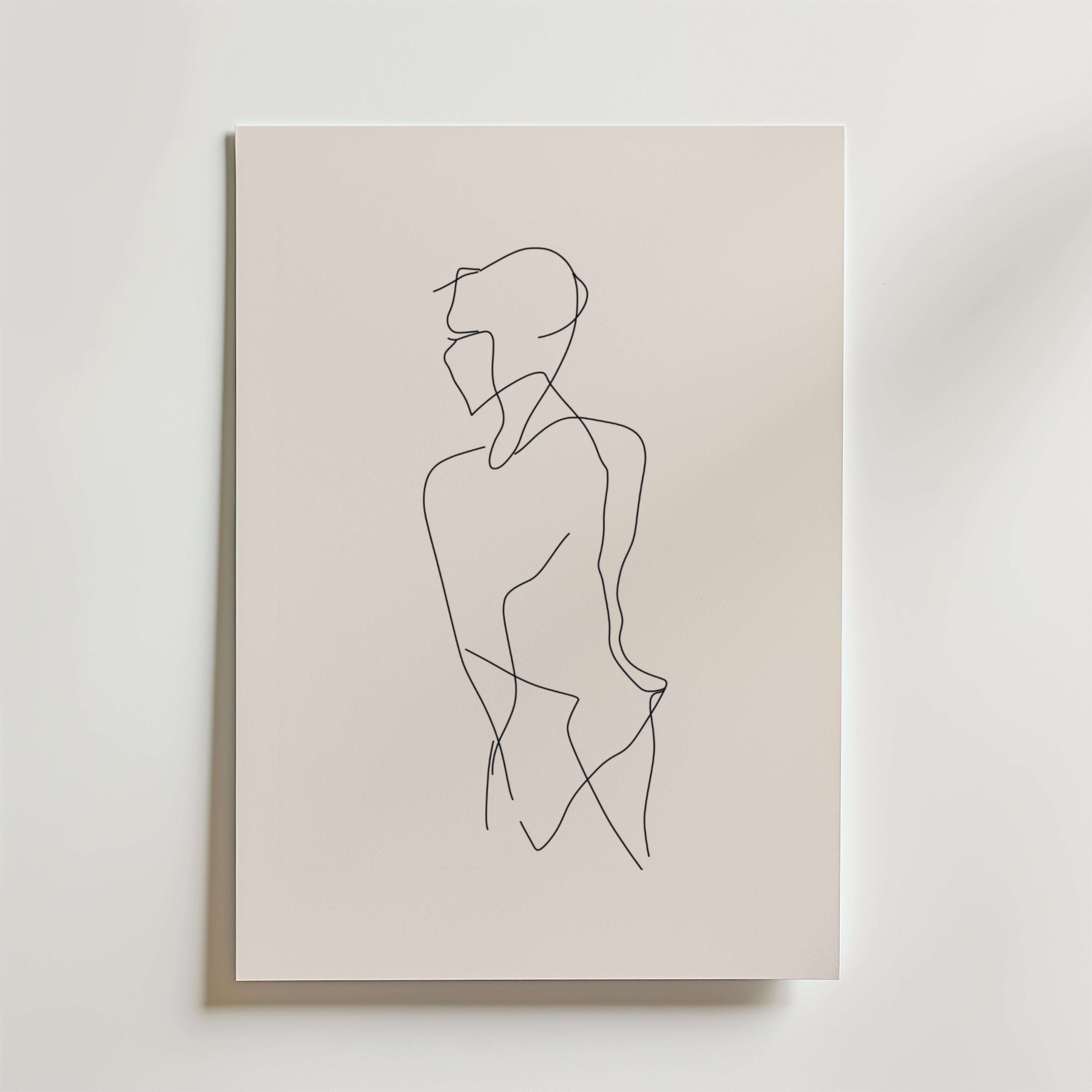Bozetto Solitary Line Body Poster visar minimalistisk linjekonst av en person i profil, ritad med en enda svart matt linje på premiumpapper mot en ljusbeige bakgrund.