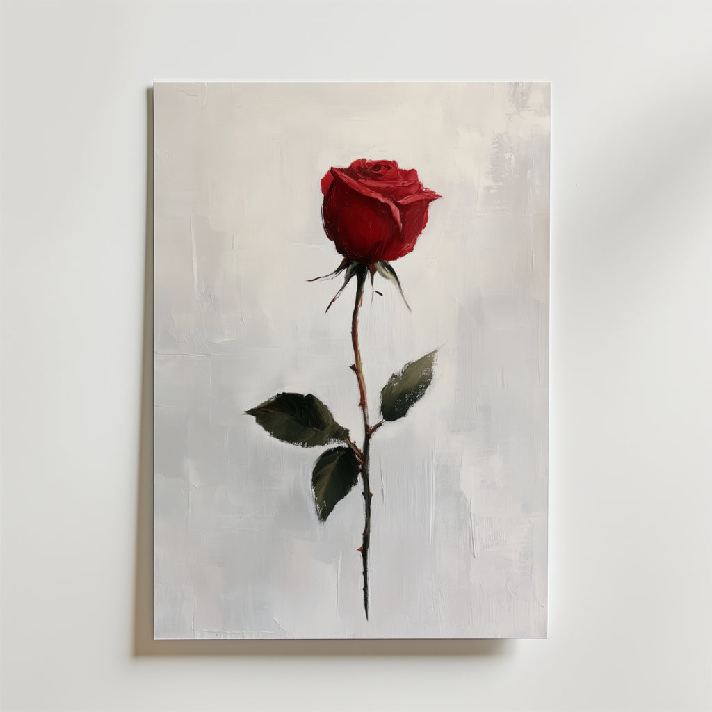 Bozetto Red Rose Poster visar en enda röd ros med gröna blad på premiumpapper mot en vit texturerad bakgrund och skapar en elegant väggkonst för ditt rum.
