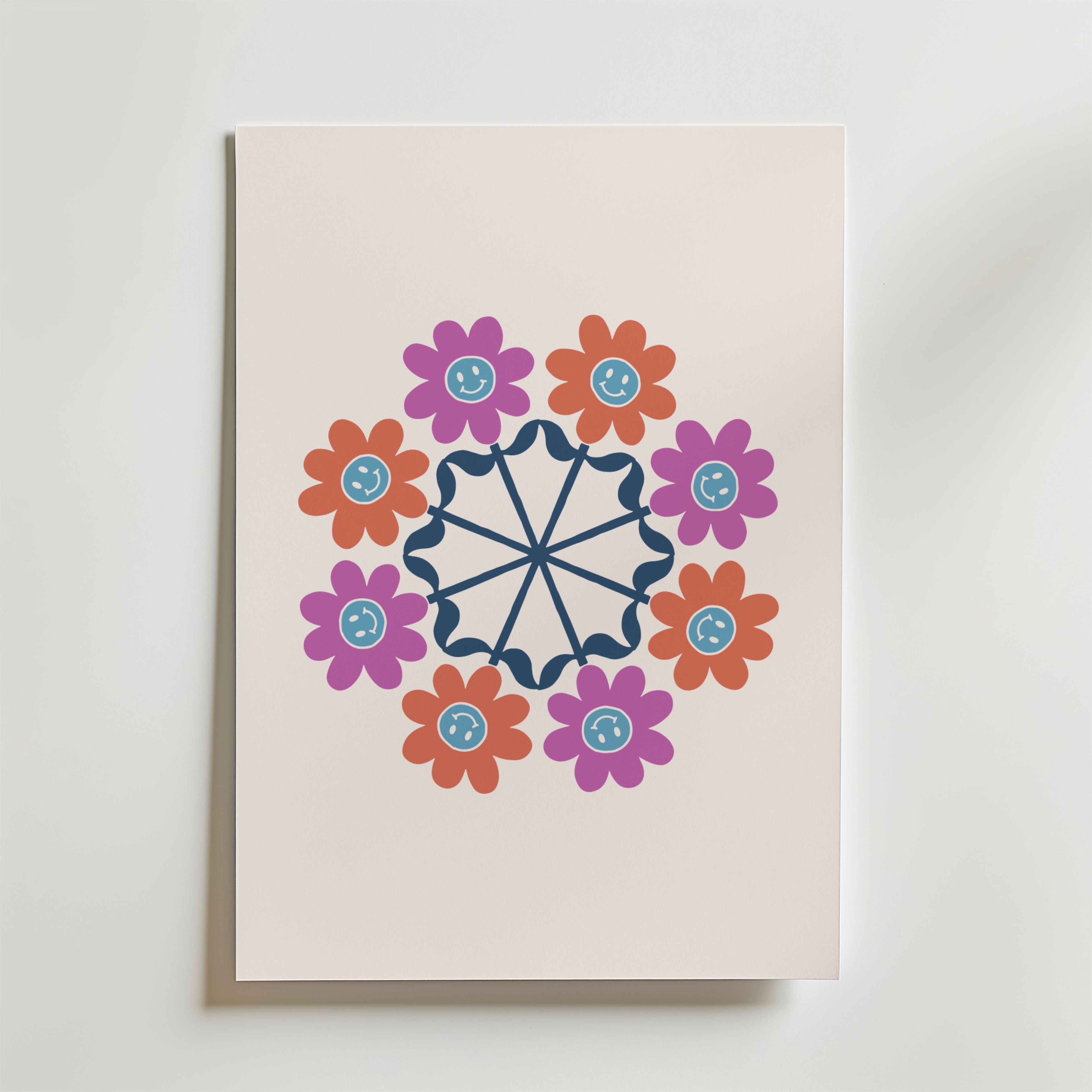 Bozetto Geometric Floral Mandala Poster visar röda och lila tecknade blommor i ett cirkulärt mönster runt en marinblå mandala på en ljus bakgrund - perfekt för dig som gillar färgglad fotokonst.