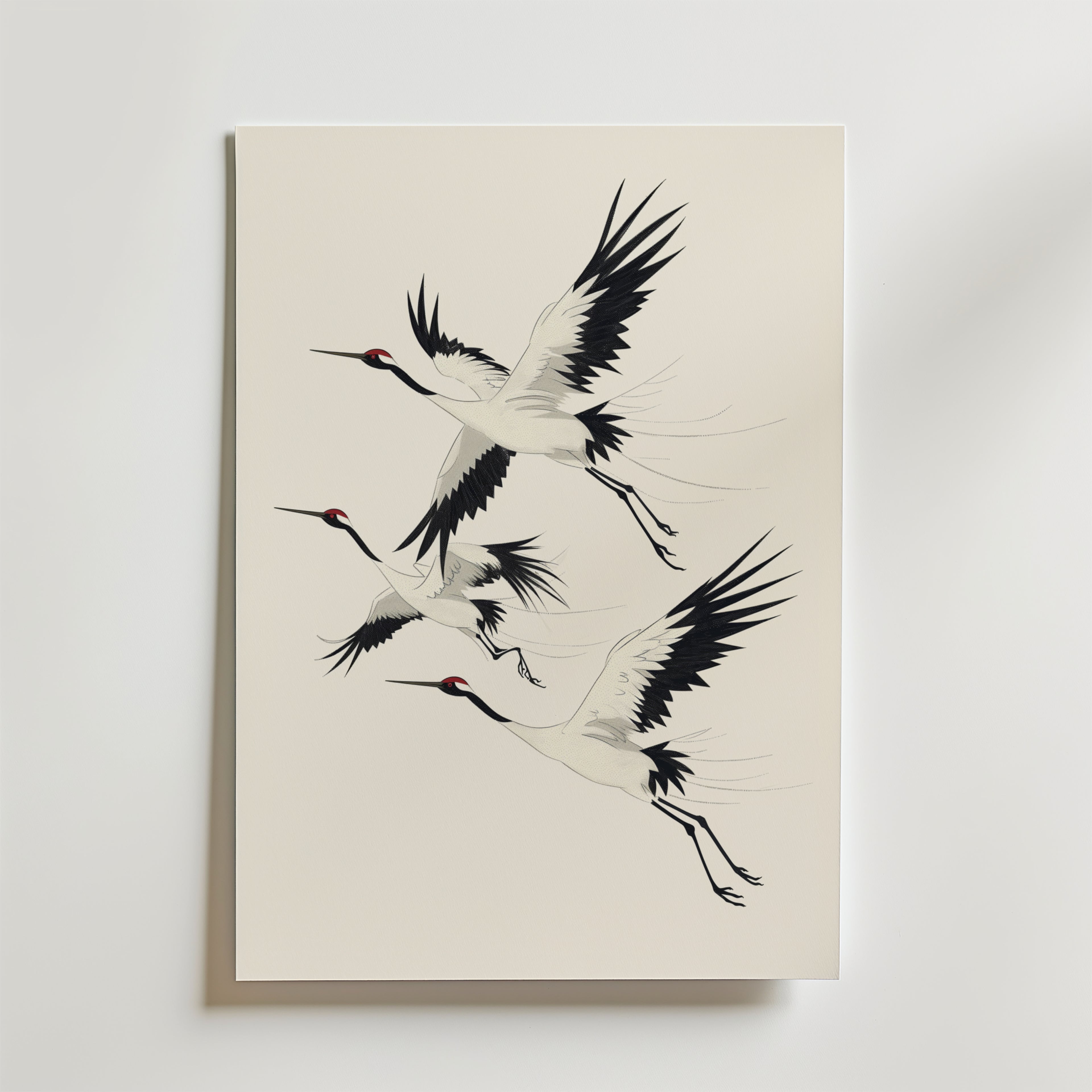 Bozetto Cranes in Flight Poster - tre eleganta tranor med svartvita fjädrar och röda kronor på ljus bakgrund, en harmonisk och tidlös dekoration.